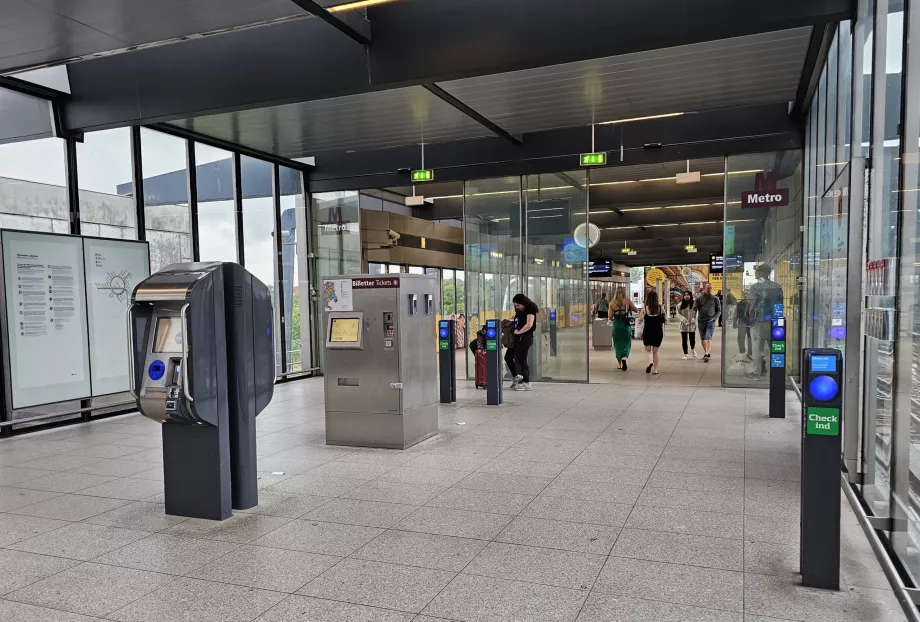 Entrance to the metro - the square machine is for regular tickets, the rounded machine in the foreground is for Rejsekort